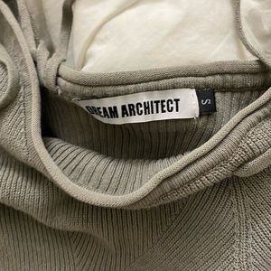 asymmetrical cut out sweater